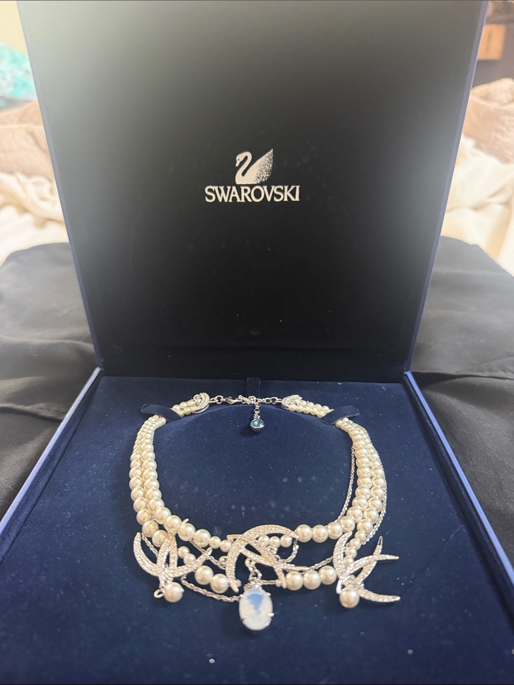 Swarovski Ivory Pearl and Crystal Multi-Strand Necklace with Blue Drop